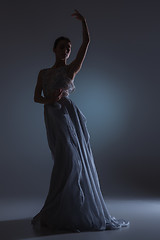 Image showing The beautiful ballerina dancing in blue long dress 