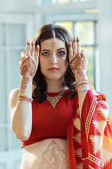 Image showing Indian picture on woman hands, mehendi tradition decoration