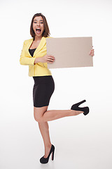 Image showing Businesswoman showing board or banner with copy space on white background 