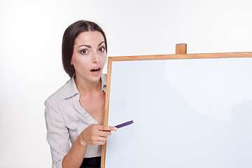 Image showing young business woman showing something on the white background