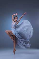 Image showing The beautiful ballerina dancing in blue long dress 