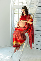 Image showing Indian picture on woman decorated with indian mehandi painted henna 