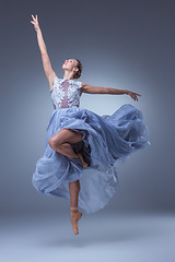 Image showing The beautiful ballerina dancing in blue long dress 