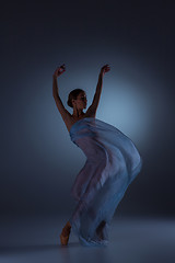 Image showing The beautiful ballerina dancing with blue veil