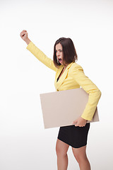 Image showing Businesswoman showing board or banner with copy space on white background 