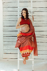 Image showing Indian picture on woman decorated with indian mehandi painted henna 