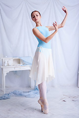 Image showing Professional ballet dancer posing on white