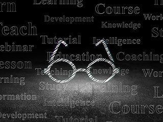 Image showing Studying concept: Glasses in grunge dark room