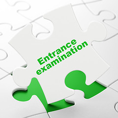 Image showing Learning concept: Entrance Examination on puzzle background