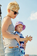 Image showing Mother, daughter on yacht.  Concept of the family