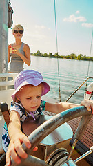 Image showing Little girl enjoying ride on yacht