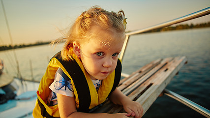 Image showing Little girl enjoying ride on yacht