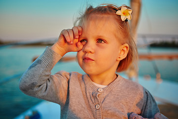 Image showing Little girl enjoying ride on yacht