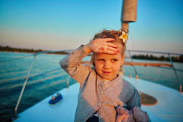 Image showing Little girl enjoying ride on yacht