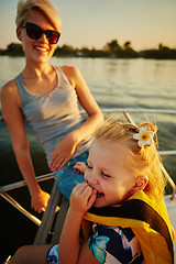 Image showing Mother, daughter on yacht.  Concept of the family