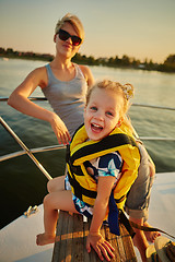 Image showing Mother, daughter on yacht.  Concept of the family