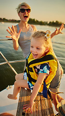 Image showing Mother, daughter on yacht.  Concept of the family