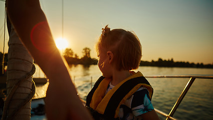 Image showing Little girl enjoying ride on yacht