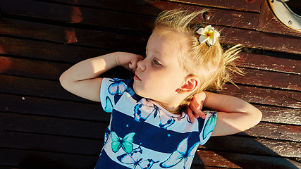 Image showing Little girl enjoying ride on yacht