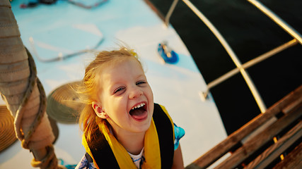 Image showing Little girl enjoying ride on yacht