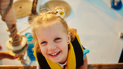 Image showing Little girl enjoying ride on yacht