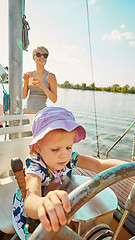 Image showing Little girl enjoying ride on yacht