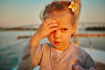 Image showing Little girl enjoying ride on yacht