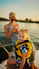 Image showing Mother, daughter on yacht.  Concept of the family