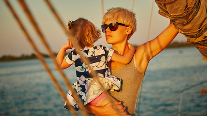 Image showing Mother, daughter on yacht.  Concept of the family