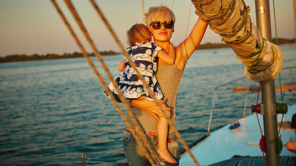 Image showing Mother, daughter on yacht.  Concept of the family