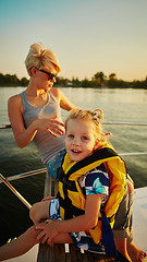 Image showing Mother, daughter on yacht.  Concept of the family