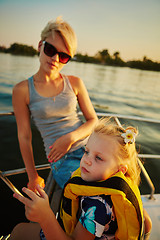 Image showing Mother, daughter on yacht.  Concept of the family