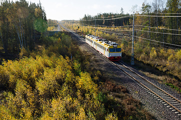 Image showing Train in fall colored landscape
