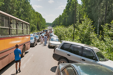 Image showing Traffic jam on road to military exhibition