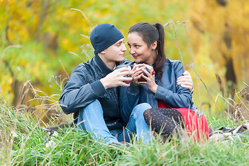 Image showing Young romantic couple relaxes on autumn nature