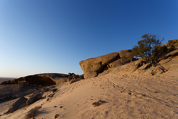 Image showing Rock formation in Namib desert in sunset, landscape