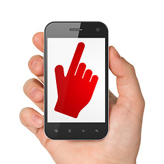 Image showing Web development concept: Hand Holding Smartphone with Mouse Cursor on display