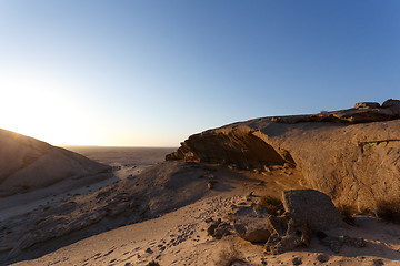 Image showing Rock formation in Namib desert in sunset, landscape