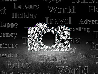 Image showing Travel concept: Photo Camera in grunge dark room