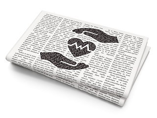 Image showing Insurance concept: Heart And Palm on Newspaper background