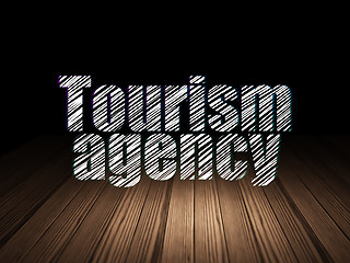 Image showing Vacation concept: Tourism Agency in grunge dark room