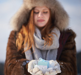Image showing winter girl with gift