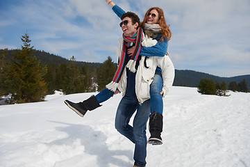 Image showing happy young couple having fun on fresh show on winter vacation