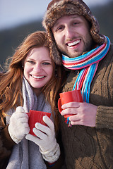 Image showing couple drink warm tea at winter