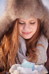 Image showing winter girl with gift