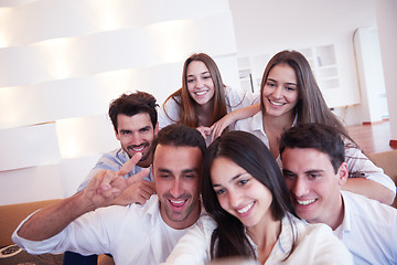 Image showing group of friends taking selfie