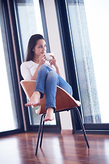 Image showing beautiful young woman drink first morning coffee