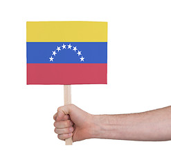 Image showing Hand holding small card - Flag of Venezuela