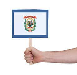 Image showing Hand holding small card - Flag of West Virginia