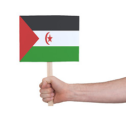 Image showing Hand holding small card - Flag of Western Sahara